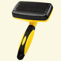Yellow and black one-button self-cleaning slicker brush for dogs